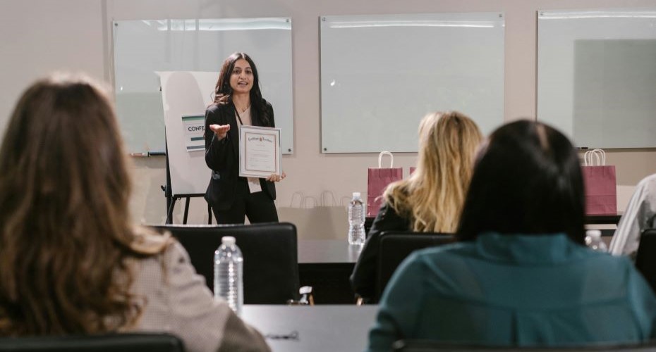 Female student speaking at a careers event