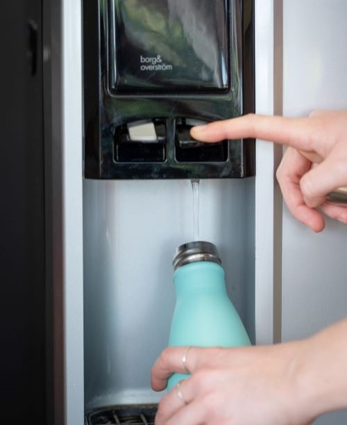 Refillable water bottle station