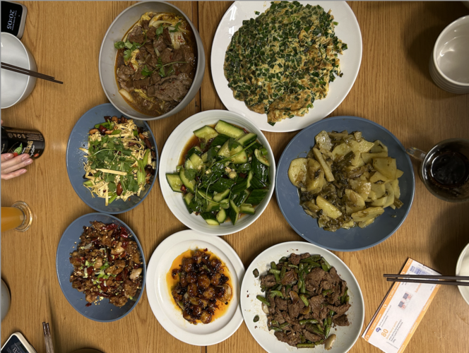 Table full of home cooked Asian food