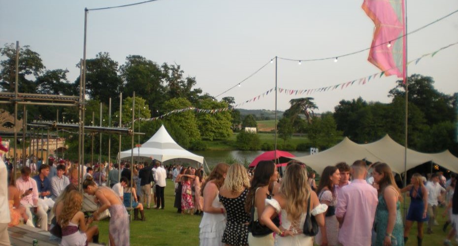 Students in formal clothes at an outdoor event