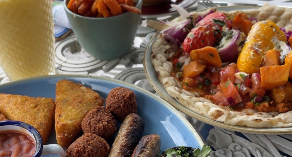 A table filled with different vegan meals and sides