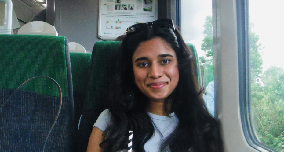 photo of Sriya sitting on a train