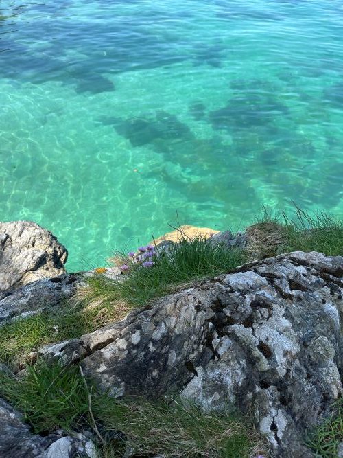 Clear blue water and rocks