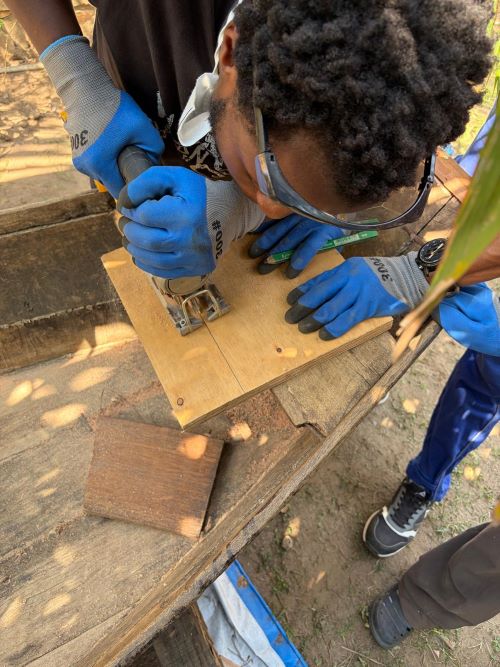 Local student working on the boat